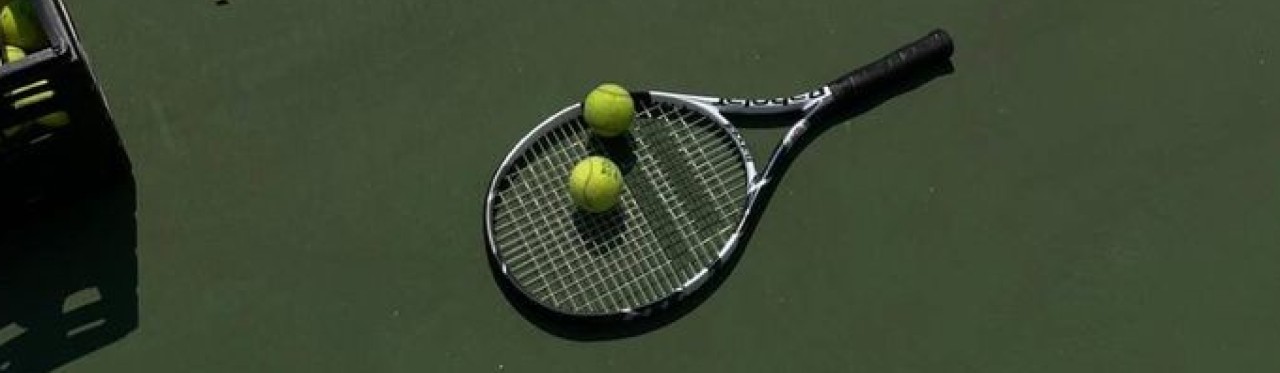 Tennis racket and balls